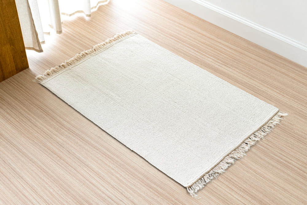 petit tapis blanc pour l'entrée